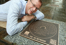 Brisbane's Deputy mayor David Hinchcliffe with The Go-betweens plaque in the Walk Of Fame